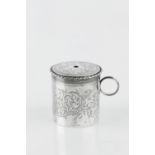 A MID-VICTORIAN SILVER CYLINDRICAL STRING BOX, engraved with scrolling foliage and with loop handle,
