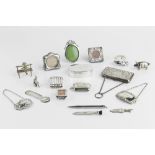 A COLLECTION OF SMALL SILVER ITEMS, to include an Edwardian Art Nouveau miniature photo frame,