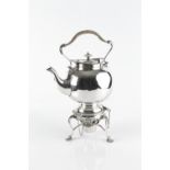A 19TH CENTURY SILVER PLATED TEA KETTLE ON STAND, with beaded borders, on scallop cast feet, 33cm