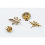 A CULTURED PEARL PANEL BROOCH, of foliate design, a further similarly set panel brooch, a citrine