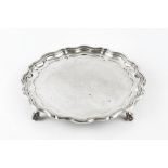 A SILVER SMALL SALVER, WITH PIECRUST BORDER, on claw and ball feet, by James Dixon & Sons Ltd,