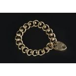 A 9CT GOLD FANCY CURB-LINK BRACELET, with padlock clasp, length 20.5cm