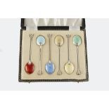 A SET OF SIX SILVER AND VARI-COLOURED ENAMEL COFFEE SPOONS, Birmingham 1960, in fitted case; another