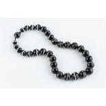 A BANDED AGATE BEAD NECKLACE, comprising a single stand of graduated beads, length 55cm