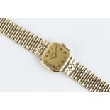 A 9CT GOLD 'DE LUXE' BRACELET WATCH BY RECORD, the cushion-shaped gilt dial with black Roman