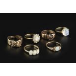 A COLLECTION OF GEM SET DRESS RINGS, comprising a moonstone dress ring, of abstract foliate