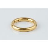 A 22CT GOLD WEDDING BAND, of court section profile, ring size J½