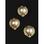 A MABE PEARL AND DIAMOND PENDANT AND EARRINGS SUITE, each shaped circular panel centred with a