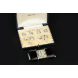 A GENTLEMAN'S MOTHER OF PEARL AND HALF PEARL DRESS SET, comprising cufflinks, buttons and studs,