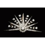 A LATE VICTORIAN/EDWARDIAN DIAMOND PANEL BROOCH/PENDANT, the fan-shaped openwork panel of