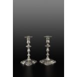 A PAIR OF MID-VICTORIAN SILVER CANDLESTICKS, with knopped baluster stems, the shaped square bases