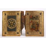 A 19th Century Siennese gilt gesso and wood book cover The upper panel printed with bishop and
