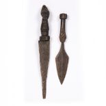 TWO DEMOCRATIC REPUBLIC OF CONGO LUBA KNIVES, both with carved wood handles, longest 33.5cm