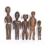 FIVE AFRICAN WOODEN DOLLS, carved wood one decorated with beads 33cm high provenance: TOMI VAN