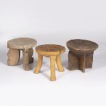 A KENYAN KAMBA STOOL, with beadwork decoration together with two other Kenyan carved wooden