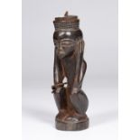 A FINE CHOKWE WOODEN SNUFF CONTAINER, in the form of a crouching man with his hands to his head,