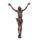 A FRUITWOOD FIGURE OF CHRIST, probably Austrian or South German, 17th Century, carved in three