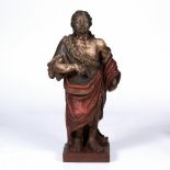 AN ITALIAN TERRACOTTA RELIEF FIGURE OF ST JOHN THE BAPTIST polychrome painted dressed in a sheepskin