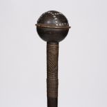 A SOUTH AFRICAN KNOBKERRIE, with a central ribbed head, the top decorated by studs to a carved