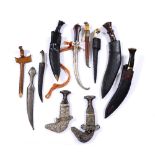 A COLLECTION OF ASIAN BLADES, including Gurkha knives, oriental bone handle daggers etc. (11)