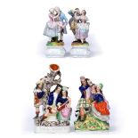 A PAIR OF CONTINENTAL PORCELAIN FIGURES of dancers with polychrome decoration on stepped base,