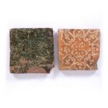 TWO ENGLISH MEDIEVAL TILES, one with green glaze the other with a inlaid slip decoration, 17.5cm