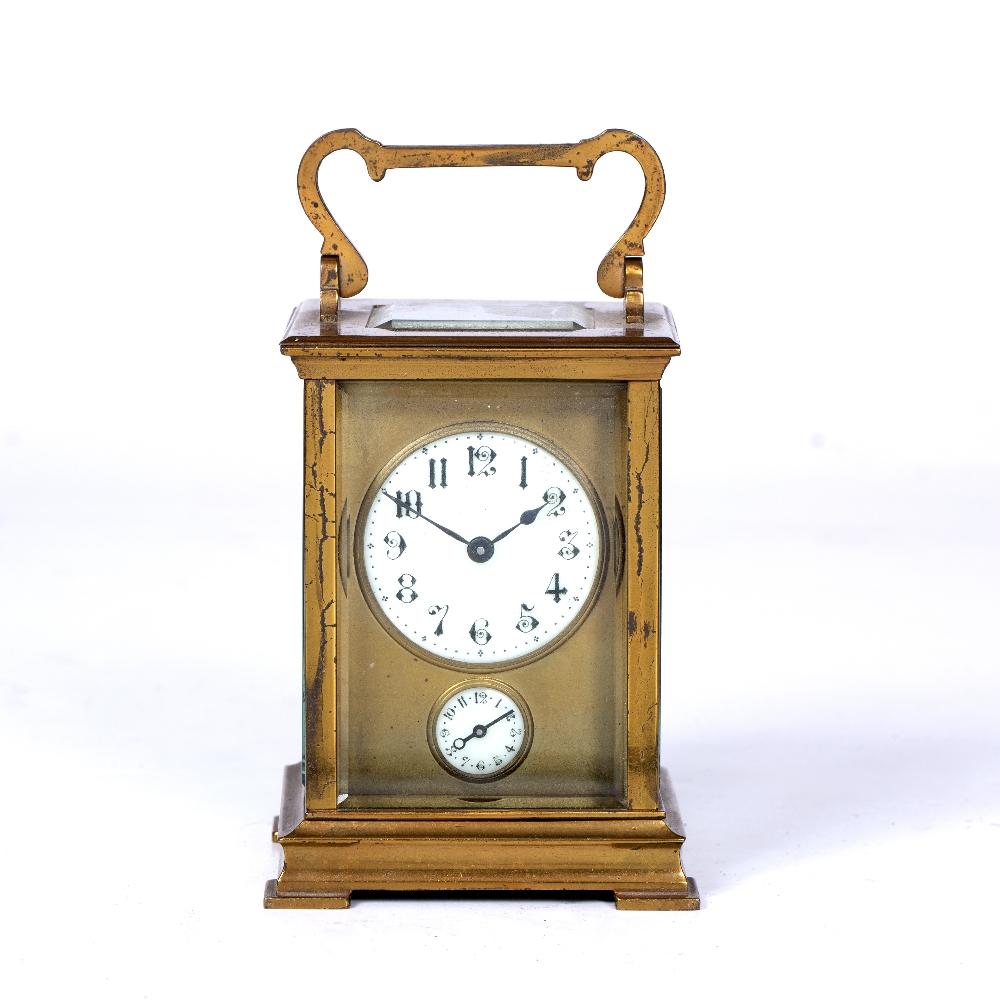 A LATE 19TH CENTURY FRENCH CARRIAGE TIMEPIECE with convex Gothic numeral dial over a subsidiary