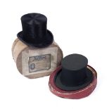 A TOP HAT, black with black band, Henry Heath Limited, aperture 19.5 x 16cm, boxed; and one