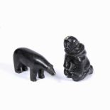 TWO INUIT STONE CARVINGS, one of a polar bear and the other of a kneeling women (2)