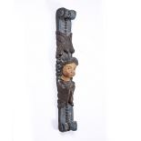AN ANTIQUE CARVED WOOD POLYCHROME TRIM PILLAR, decorated with a cherub, 77.5cm long