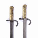 TWO 19th CENTURY CHASSEPOT BAYONETS, with downswept quillon, manufacturer's name and 1872