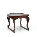 A CHINESE LOW TABLE, stained red wood, 28cm high.