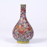 AN EARLY 20TH CENTURY CHINESE BOTTLE VASE, ceramic decorated by millefiori and dragon pattern,