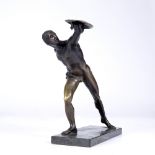 AN ITALIAN BRONZE FIGURE OF A GLADIATOR, 19th Century, on marble base, 16cm high, 22.5cm across.