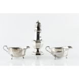 A SILVER SUGAR CASTOR, of octagonal baluster form, by William Adams Ltd, Birmingham 1924, 21cm high,