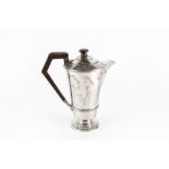 AN ART DECO STYLE SILVER HOT WATER POT, of tapered form with angular composite handle, on stepped