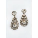 A PAIR OF LATE 18TH/EARLY 19TH CENTURY PASTE EAR PENDANTS, each suspending a pear-shaped cluster