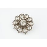 A DIAMOND CLUSTER PANEL BROOCH/PENDANT, designed as a flowerhead cluster of graduated cushion-shaped