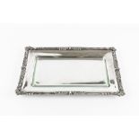 AN EARLY 20TH CENTURY AUSTRIAN SILVER RECTANGULAR SERVING DISH, the border pierced and cast with