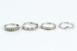 THREE DIAMOND HALF HOOP RINGS, the first channel set with a line of round brilliant-cut diamonds,
