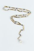 A CULTURED PEARL PENDANT NECKLACE, the 18ct two colour gold fancy-link necklace with part brushed