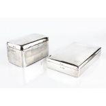 A SILVER CIGARETTE BOX, of shallow rectangular plain design, by the Alexander Clark Manufacturing