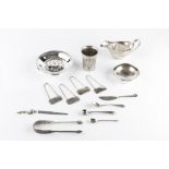 A COLLECTION OF SILVER, comprising a sauceboat by Barker Bros Ltd, Birmingham 1937, a Continental