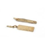 AN EDWARDIAN 9CT GOLD WHISTLE, by Sampson Mordan & Co, Chester 1907, 3.7cm long, 5.3g; and a 9ct