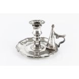 A WILLIAM IV SILVER CHAMBERSTICK, with shaped border, complete with snuffer, by Thomas, James &