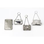 AN EDWARDIAN SILVER PURSE, embossed and engraved with birds and scrolling foliage, on chain, by
