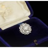 A LATE VICTORIAN DIAMOND CLUSTER BROOCH/PENDANT, designed as a flowerhead of old-cut diamond