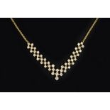 A DIAMOND PENDANT NECKLACE, designed as an articulated lattice of round brilliant-cut diamonds in