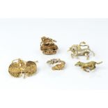 A COLLECTION OF JEWELLERY, comprising a 9ct two colour gold unicorn brooch by Harriet Glen, a 9ct