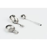 A GEORGE III SILVER CADDY SPOON, of scalloped form, maker B.Co, Birmingham 1801, 5.2cm; another,